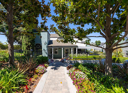 A house with a garden in front.