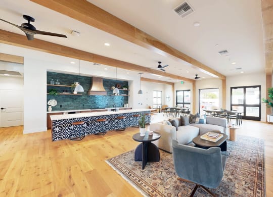a living room with a couch and a table   and a kitchen at The Villas at Anacapa Canyon, Camarillo