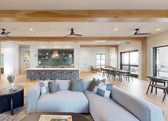 a living room with a couch and a table at The Villas at Anacapa Canyon, Camarillo