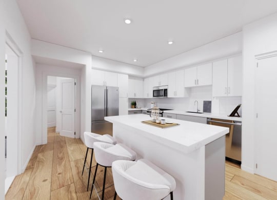 a white kitchen with a white counter and white chairs at The Villas at Anacapa Canyon, Camarillo, CA, 93012
