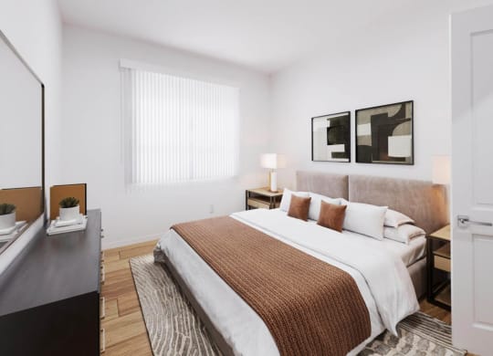 a bedroom with a bed and a large window at The Villas at Anacapa Canyon, Camarillo, California