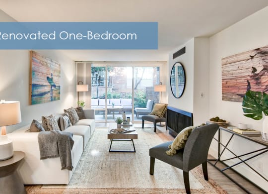 a living room with a white couch and a fireplace and the words renovated one bedroom at The Meadows Apartments, California, 90230