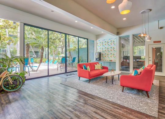 a living room with a couch and chairs and a patio  at Rancho Los Feliz, Los Angeles, CA, 90039