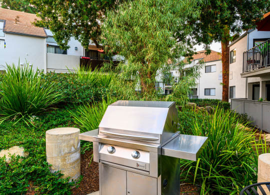 a stainless steel barbecue grill in the backyard of a house at Sendero Huntington Beach, Huntington Beach, CA