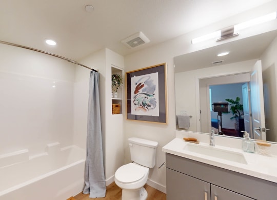a bathroom with a shower and a toilet and a sink at The Villas at Anacapa Canyon, Camarillo, 93012