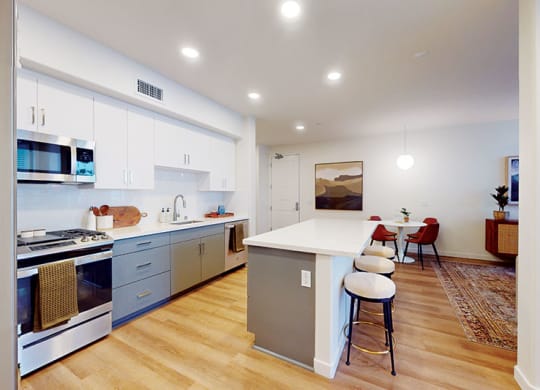a kitchen with a white counter top and a stove at The Villas at Anacapa Canyon, California, 93012