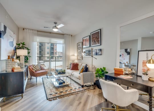 a spacious living room with white walls and hardwood flooring at Aurora Watson Branch, Mansfield
