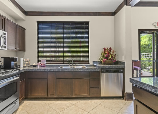 A large kitchen clubhouse ready for gatherings  at Adiamo Palm Valley, Arizona