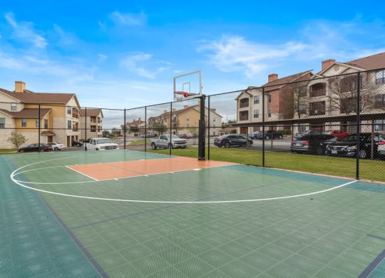 Enjoy a pick up game on the sport court! at The Fairways at Star Ranch, Hutto, Texas