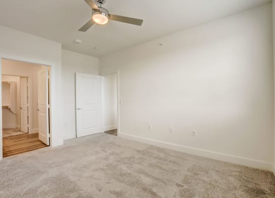 a spacious living room with carpet and a ceiling fan at Aurora Watson Branch, Texas, 76063