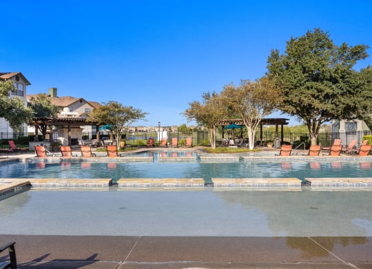 the swimming pool at the preserve at polo ridge apartments at The Fairways at Star Ranch, Hutto, Texas