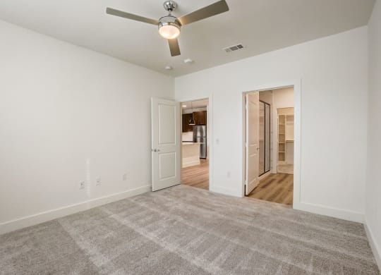a spacious living room with carpet and a ceiling fan at Aurora Watson Branch, Mansfield, TX, 76063