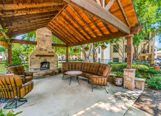 Outdoor Fireplace and covered lounge at The Canyons Apartments, Fort Worth, Texas