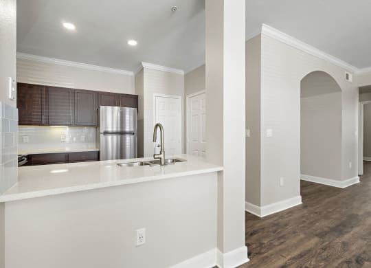 a kitchen with a large counter top and a sink at The Verandah, Austin, TX