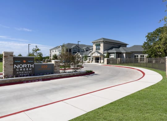 the entrance to the neighborhood apartments at North Creek, Hutto, TX