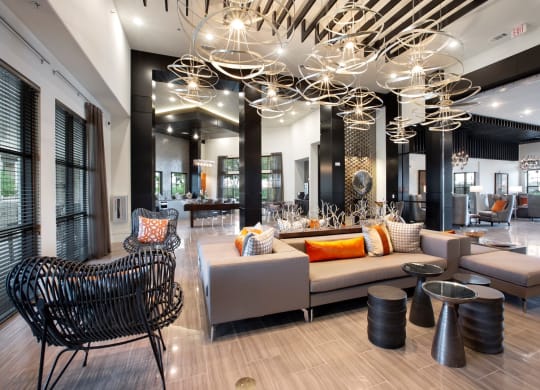 the lobby of a hotel with couches and chairs at North Creek, Hutto, Texas