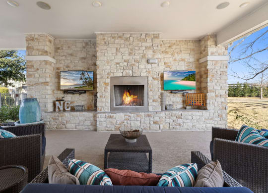 Living Area With Fireplace at North Creek, Hutto, 78634