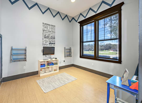 Living Area With TV at Las Brisas Apartment Homes, Round Rock, Texas