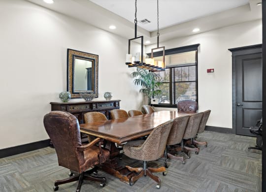a conference room with a large table and chairs at Las Brisas Apartment Homes, Round Rock, 78665