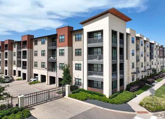 Apartment Building Exterior at Aurora Watson Branch, Texas, 76063