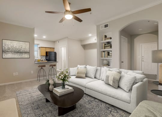 a living room with a couch and a coffee table  at The Vista on Brodie, Austin