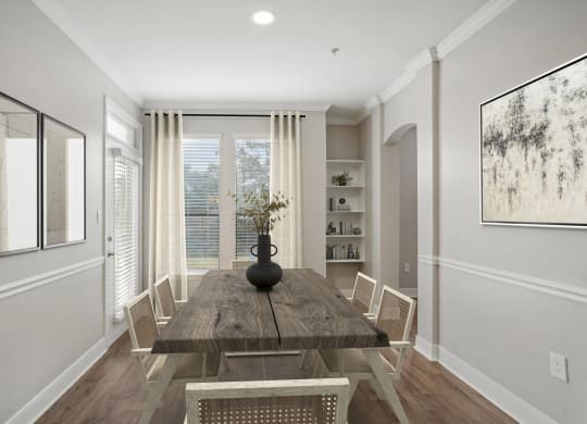 a dining room with a wooden table and chairs  at The Verandah, Texas, 78726