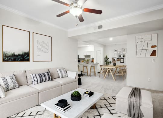 a living room with a couch and a coffee table at La Ventura Apartments, Plano, 75093