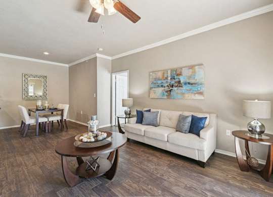 a living room with a couch and a table