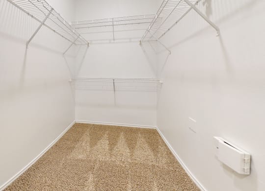 Closet at The Canyons Apartments, Fort Worth, Texas