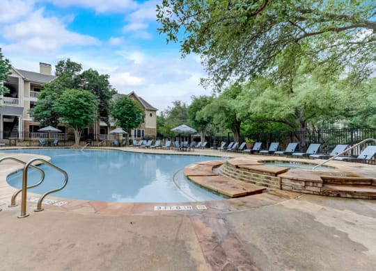 the swimming pool at the preserve at polo towers apartments