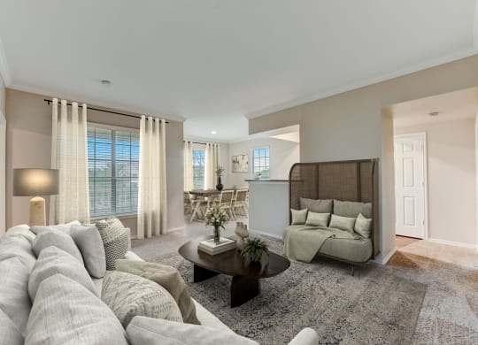 a living room with a couch and a table