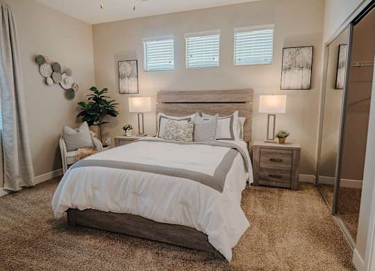 Comfortable Bedroom With Accessible Closet at Level 25 at The Curve by Picerne, Las Vegas, NV, Nevada