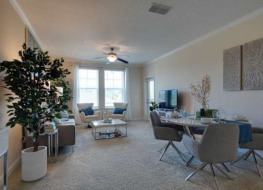 Living Area with Dining Table at The Oasis at Town Center Apartments, Jacksonville, FL, 32246