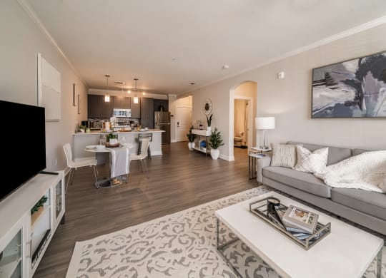 a living room with a couch and a table at The Oasis at Plymouth, Plymouth, MA, 02360