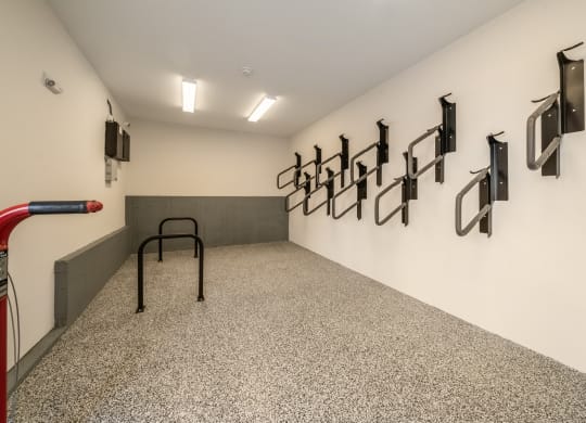 a room with a wall with a row of video monitors on the wall at The Oasis at Plymouth, Massachusetts, 02360