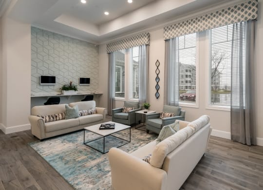 a living room with couches and a coffee table at The Oasis at Plymouth, Plymouth, MA