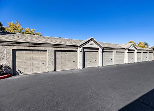 A row of garage doors are closed.