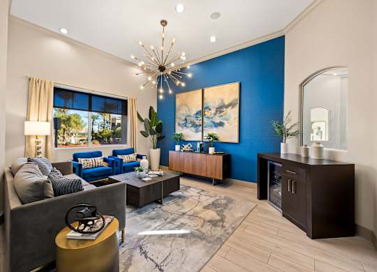 Leasing waiting area with couches and refreshments