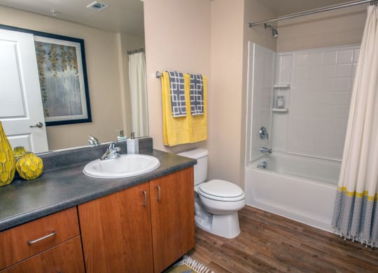 a bathroom with a sink toilet and shower at Loreto & Palacio Apartments, Nevada 89149