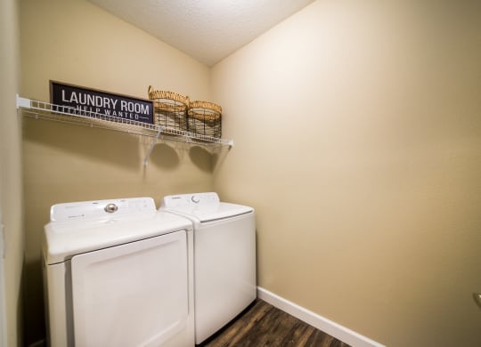 our apartments have a spacious laundry room with a washer and dryer at The Oasis at Highwoods Preserve, Tampa