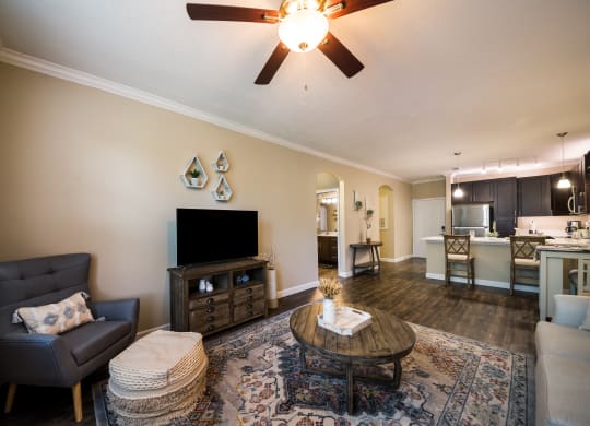 a living room with a couch and a table at The Oasis at Highwoods Preserve, Tampa, 33647