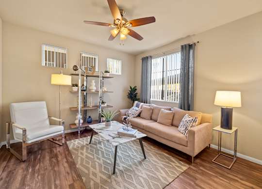Living room with windows and casual comfortable furniture