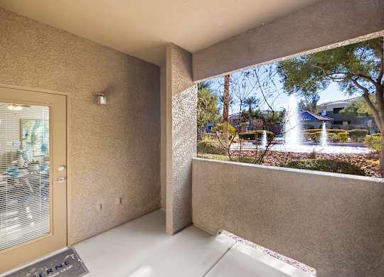 Patio with view of water fountain