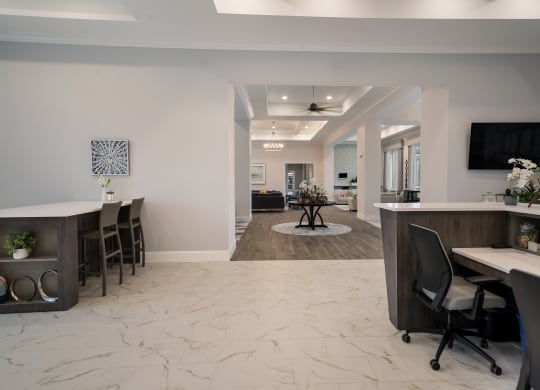 a view of a living room and a dining room with a table and chairs at The Oasis at Plymouth, Massachusetts, 02360