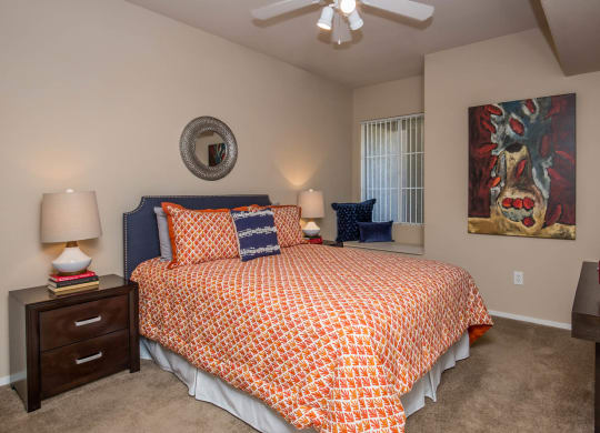 Bedroom with cozy bed and ceiling fan and lights at The Belmont by Picerne, Nevada