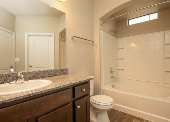 Bathroom area with wooden cabinet at The Cantera by Picerne, Nevada, 89139