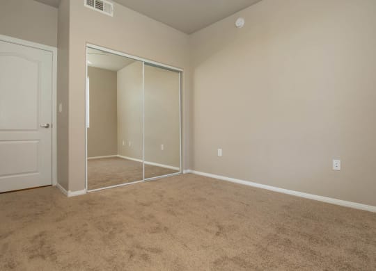 Unfurnished room with wooden floor1 at The Cantera by Picerne, Las Vegas, NV, 89139