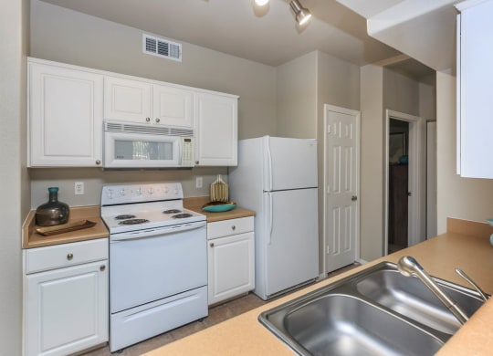 White appliances at The Covington by Picerne, Las Vegas, NV, 89139