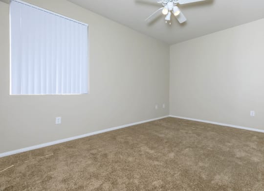 Unfurnished room area and wooden floor at The Covington by Picerne, Nevada