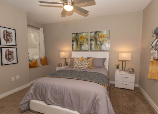 Bedroom with ceiling fan and lights at Level 25 at Cactus by Picerne, Nevada
